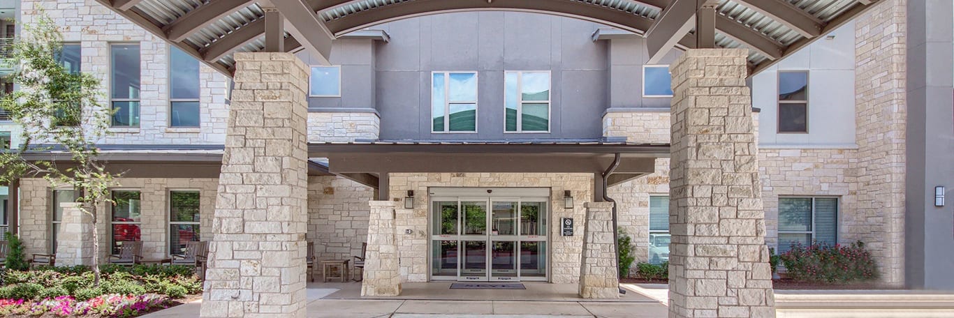 Entrance to verena at leander luxury senior living retirement apartments in leander, texas