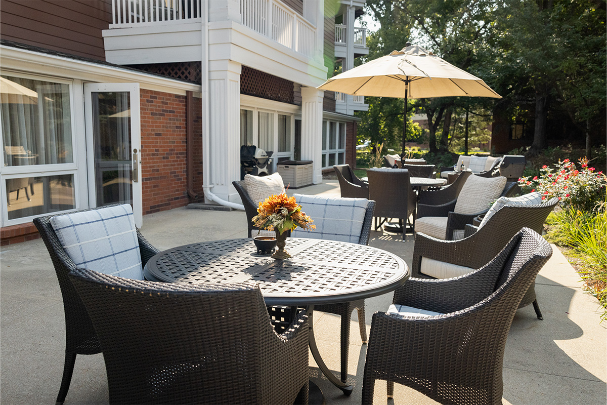 Bright and welcoming outdoor sitting area at Bloomfield Senior Living Community in Omaha Nebraska.