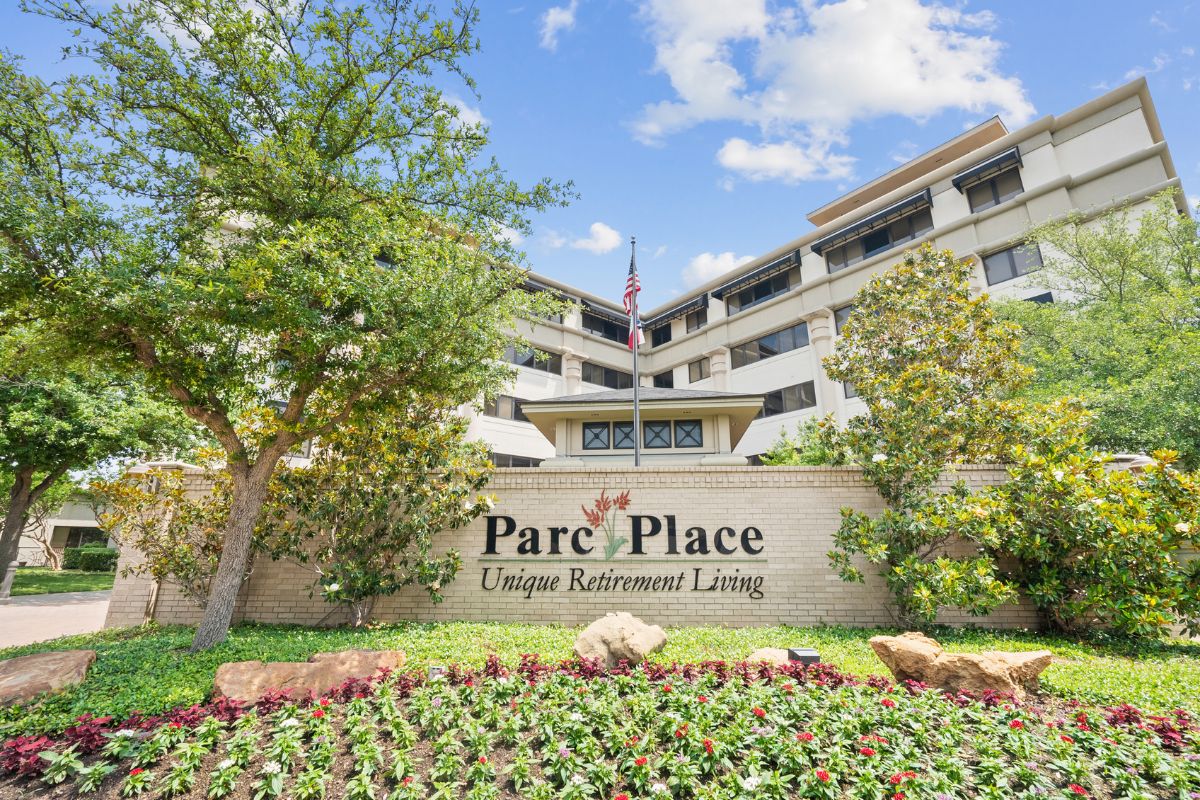 Front entrance to Parc Place Active Adult Senior Living Community in Bedford Texas