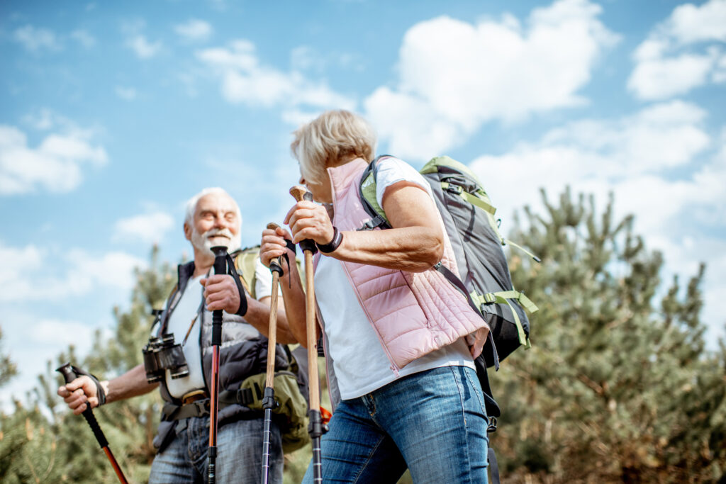 Senior couple hiking in the forest, retirement, true connection communties, verena at gilbert