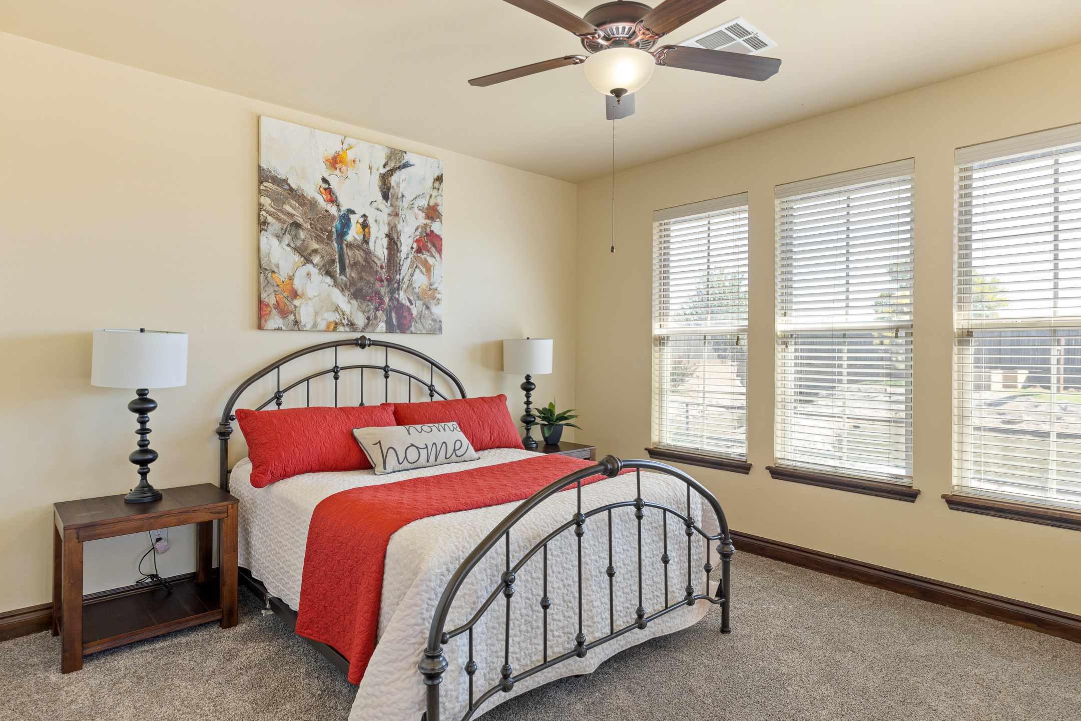 Bright and spacious bedroom in Grace Pointe Senior Living Community in Oklahoma.