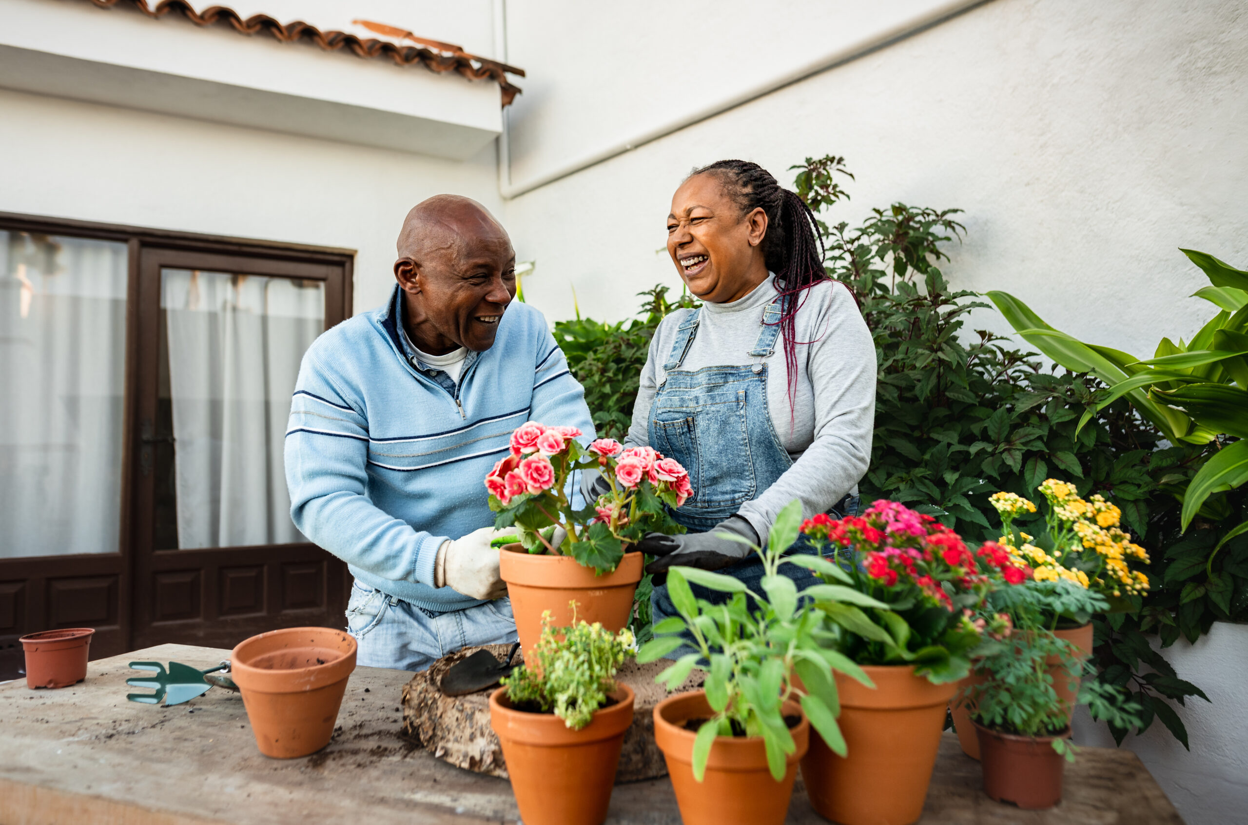 Spring-Activities-for-Seniors-at-True-Connection-Communities-couple-gardening-during-spring