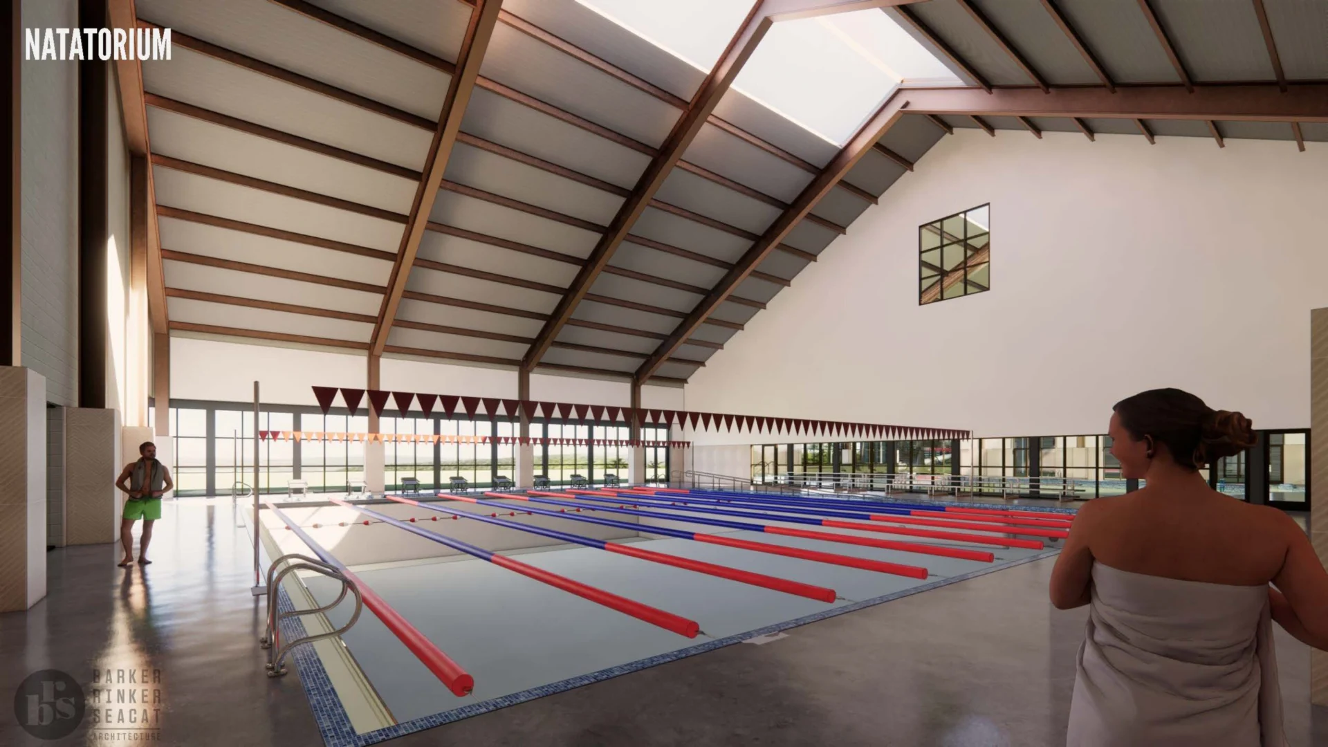 A large indoor swimming pool with multiple lanes, high ceilings, and natural light from skylights offers a perfect amenity for senior living. One person in a towel stands in the foreground, while another is near the pool. NATATORIUM appears in the top left corner.