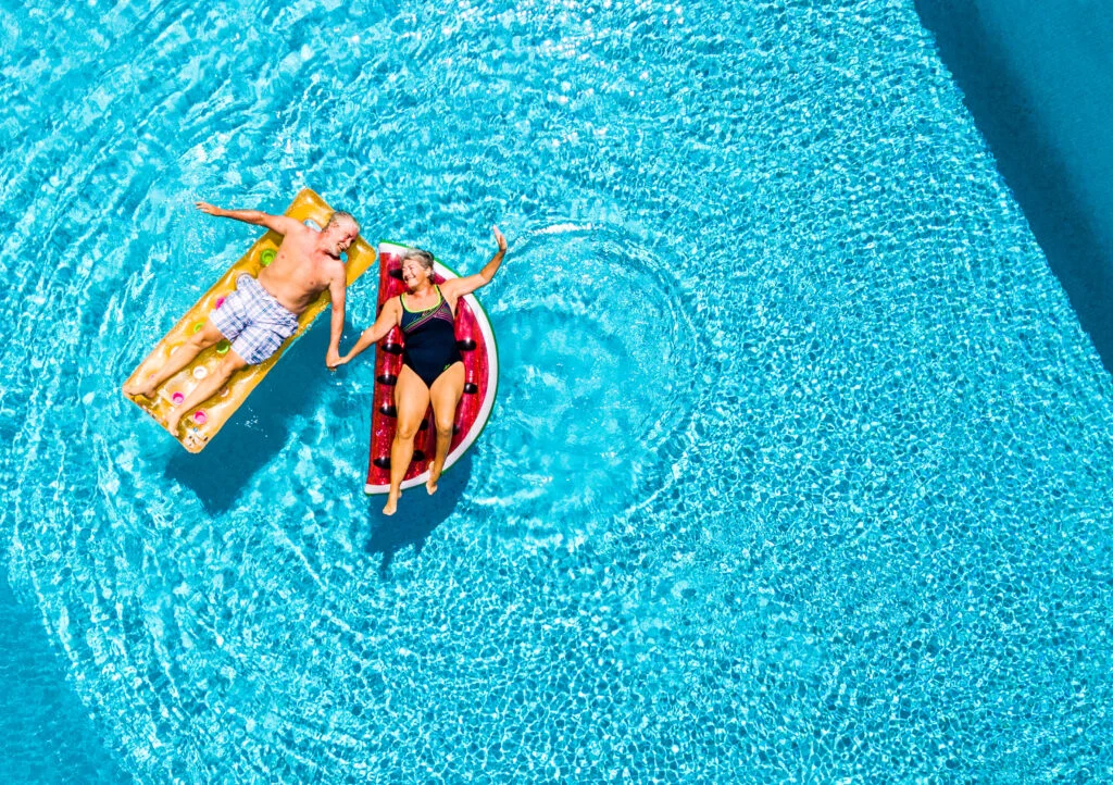 senior activities in summer floating in the pool