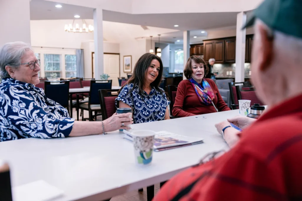 Mon Abri seniors socializing together in the common area
