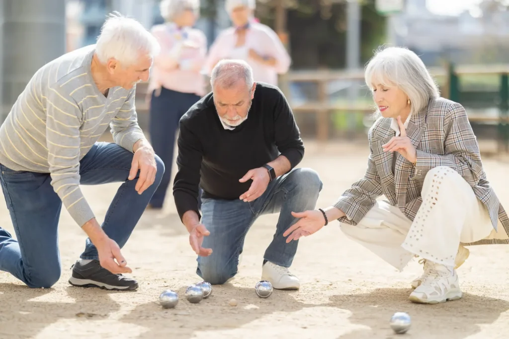 Seniors playing outdoor games together